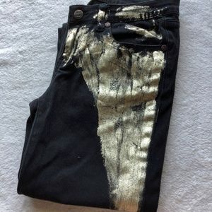 Black jeans with gold paint